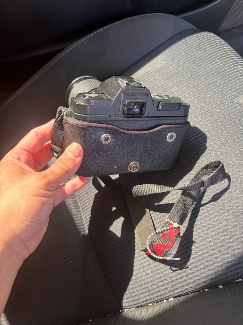 Pentax Black SLR Camera with Telephoto Lens